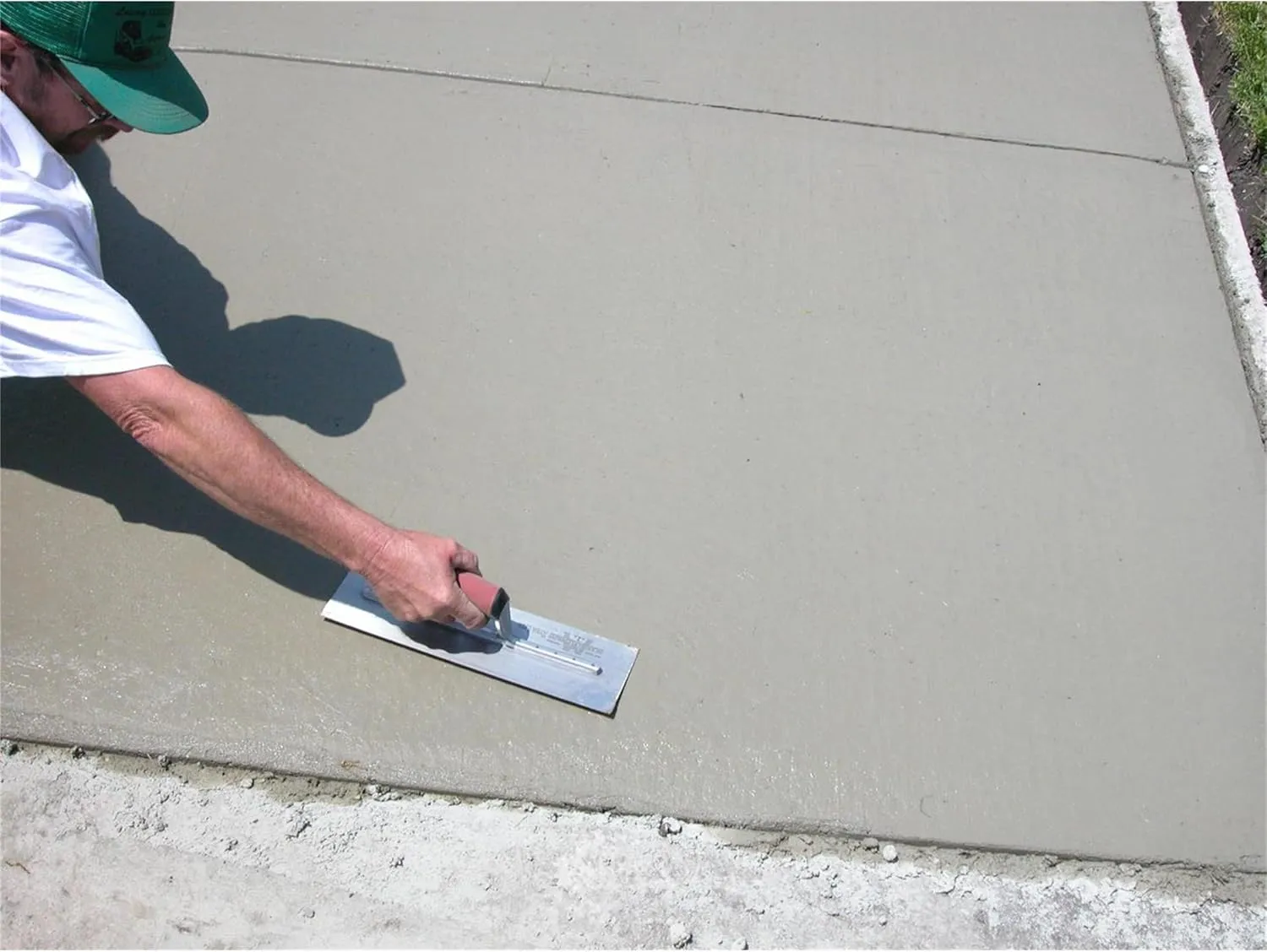 Marshalltown Finishing Trowel, 12 by 3 Inch, Perfect for Spackling, Sheetrock, Stucco, Concrete, EIFS and More, DuraSoft Curved Handle, High Carbon Steel Blade, Xtralite Mounting, MXS56D